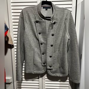 Tommy jacket. Super cute!! Size runs a little larger than L